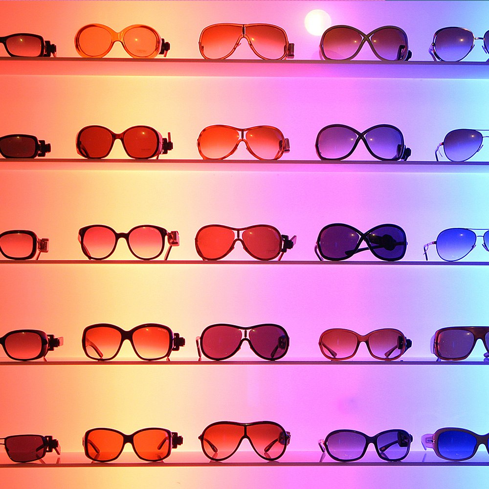 A group of multiple brands of sunglasses